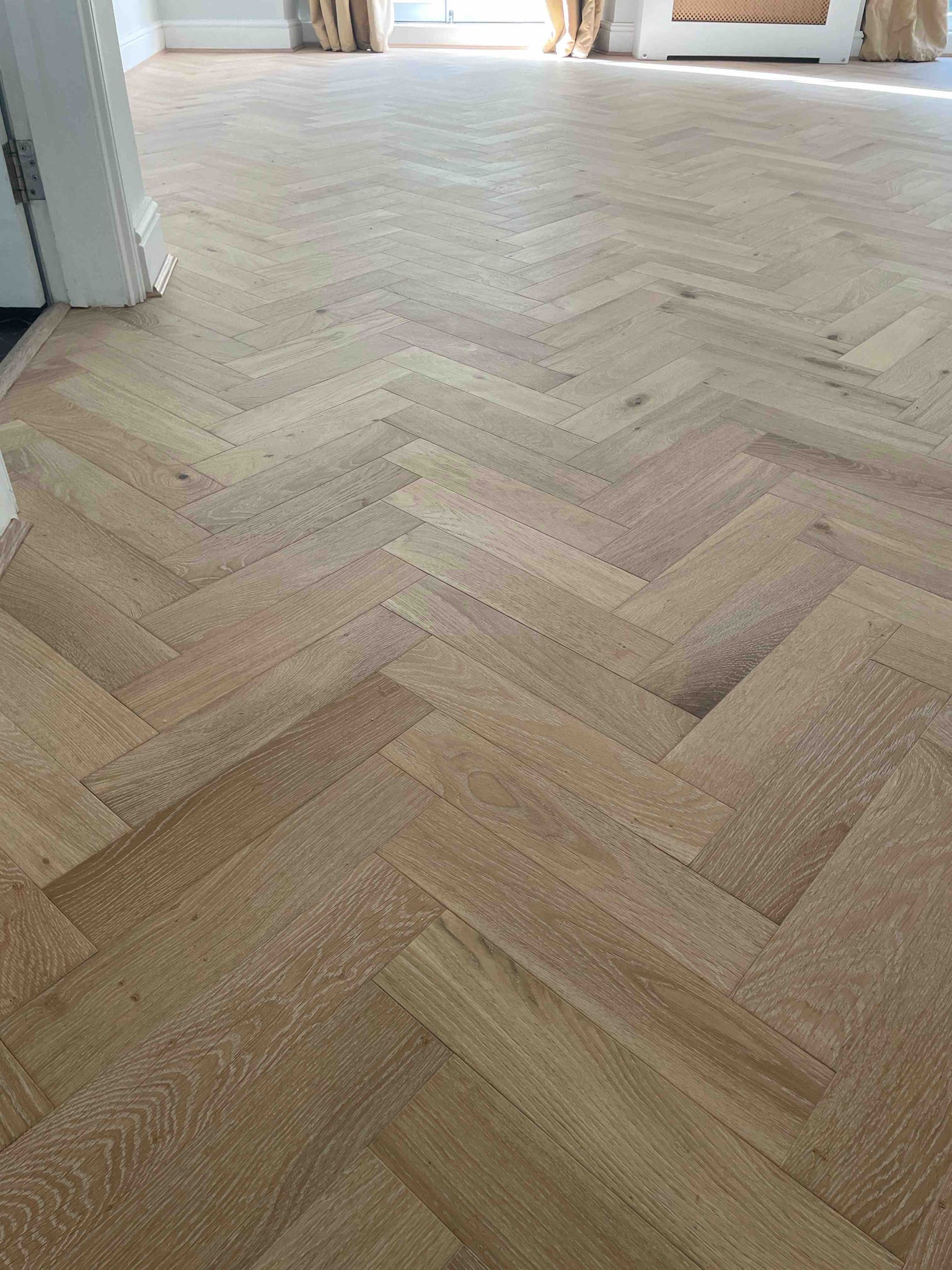 A wonderful wooden herringbone parquet floor fitted in London