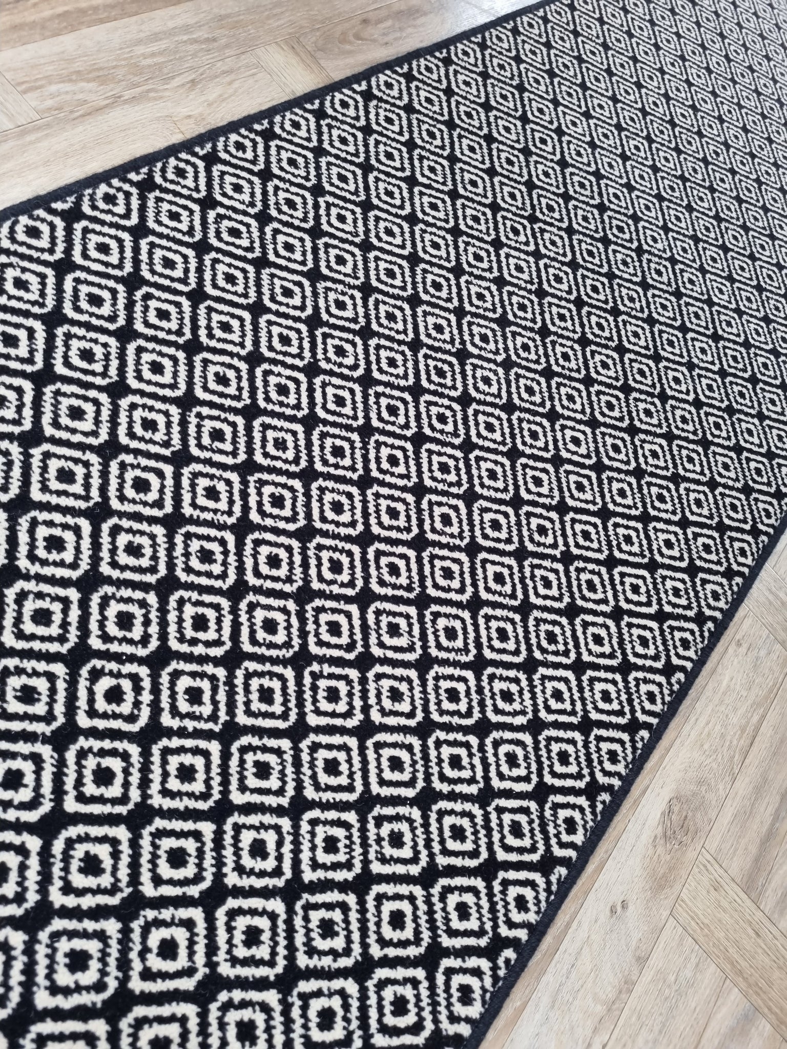 Black and white geometric pattern carpet stair runner wool blend