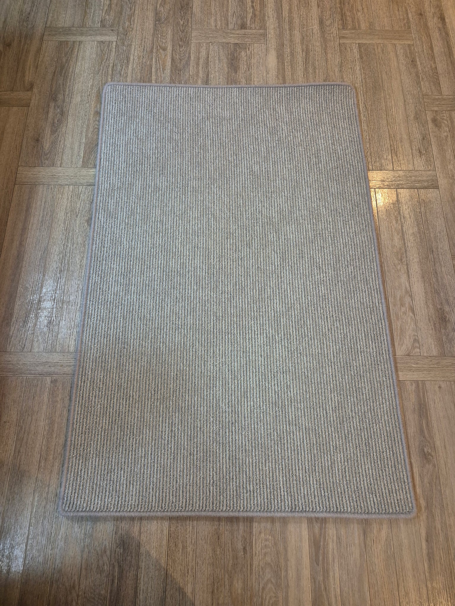 Mid grey bespoke sized rug with whipped edge - designer style R103