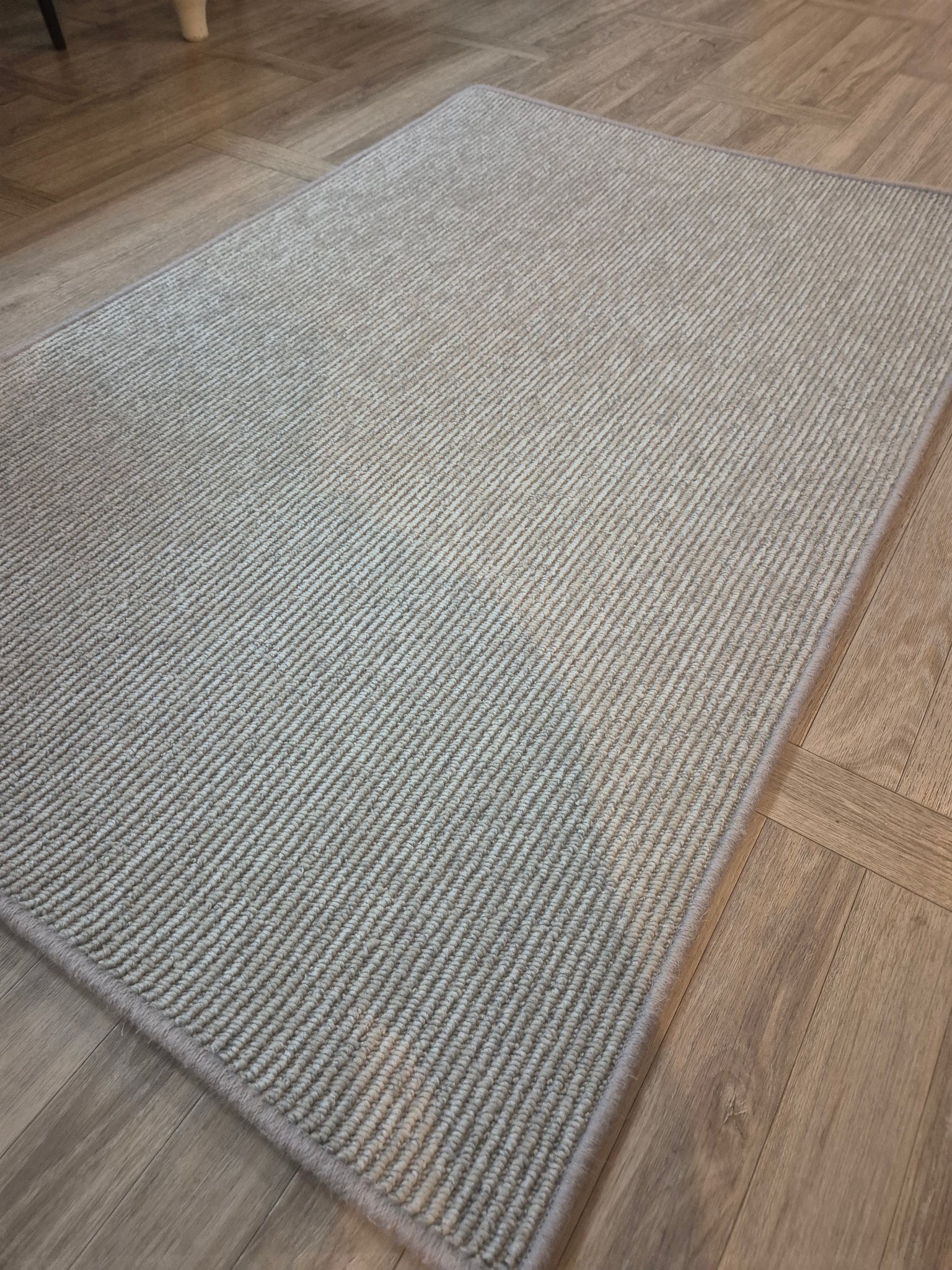 Mid grey bespoke sized rug with whipped edge - designer style R103