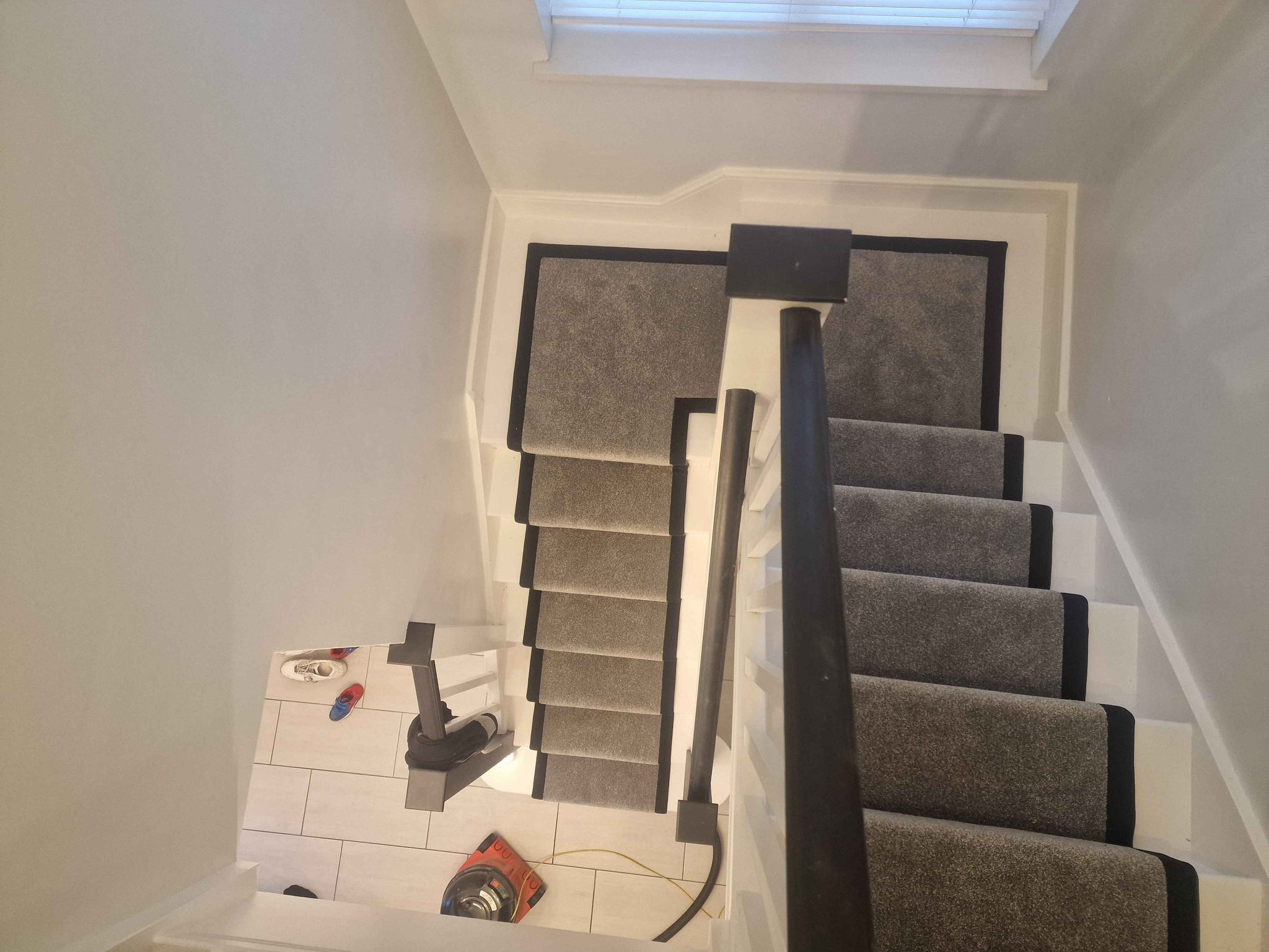 Dark grey Apollo Plus Rainstorm stair runner with black border tape