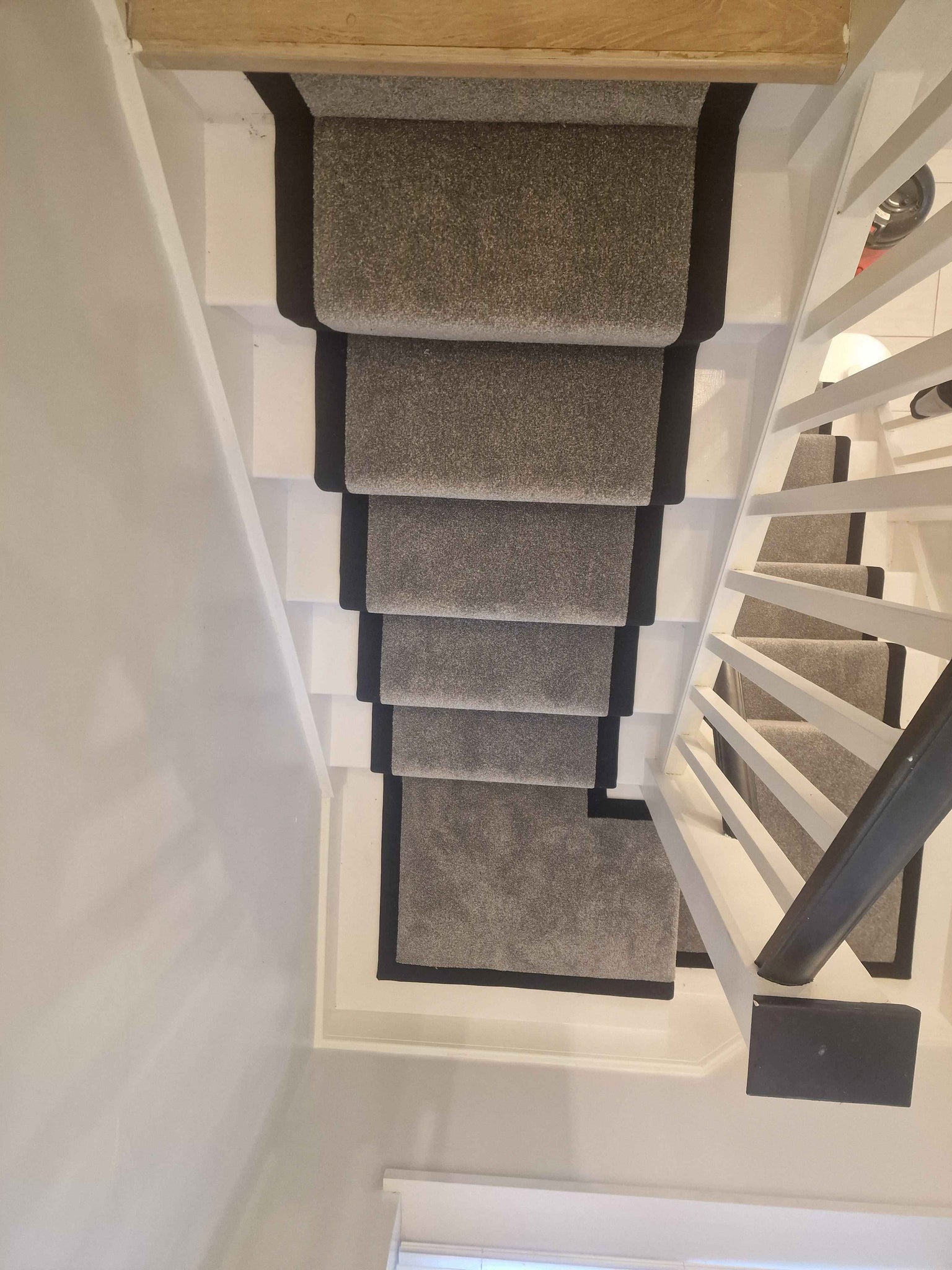 Dark grey Apollo Plus Rainstorm stair runner with black border tape