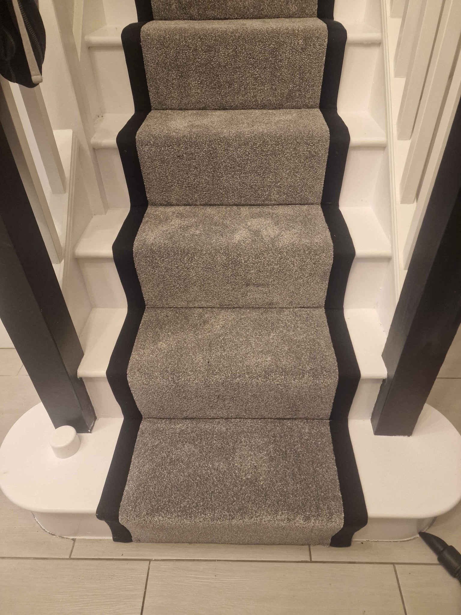 Dark grey Apollo Plus Rainstorm stair runner with black border tape