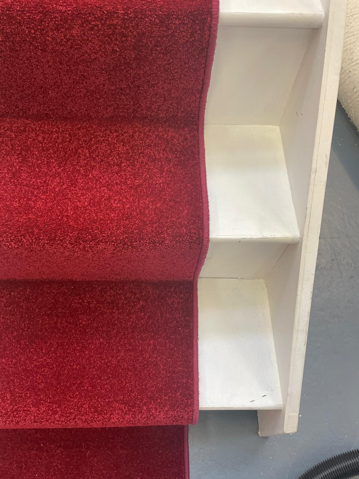Royal red carpet stair runner with whipped edge and stain resistant