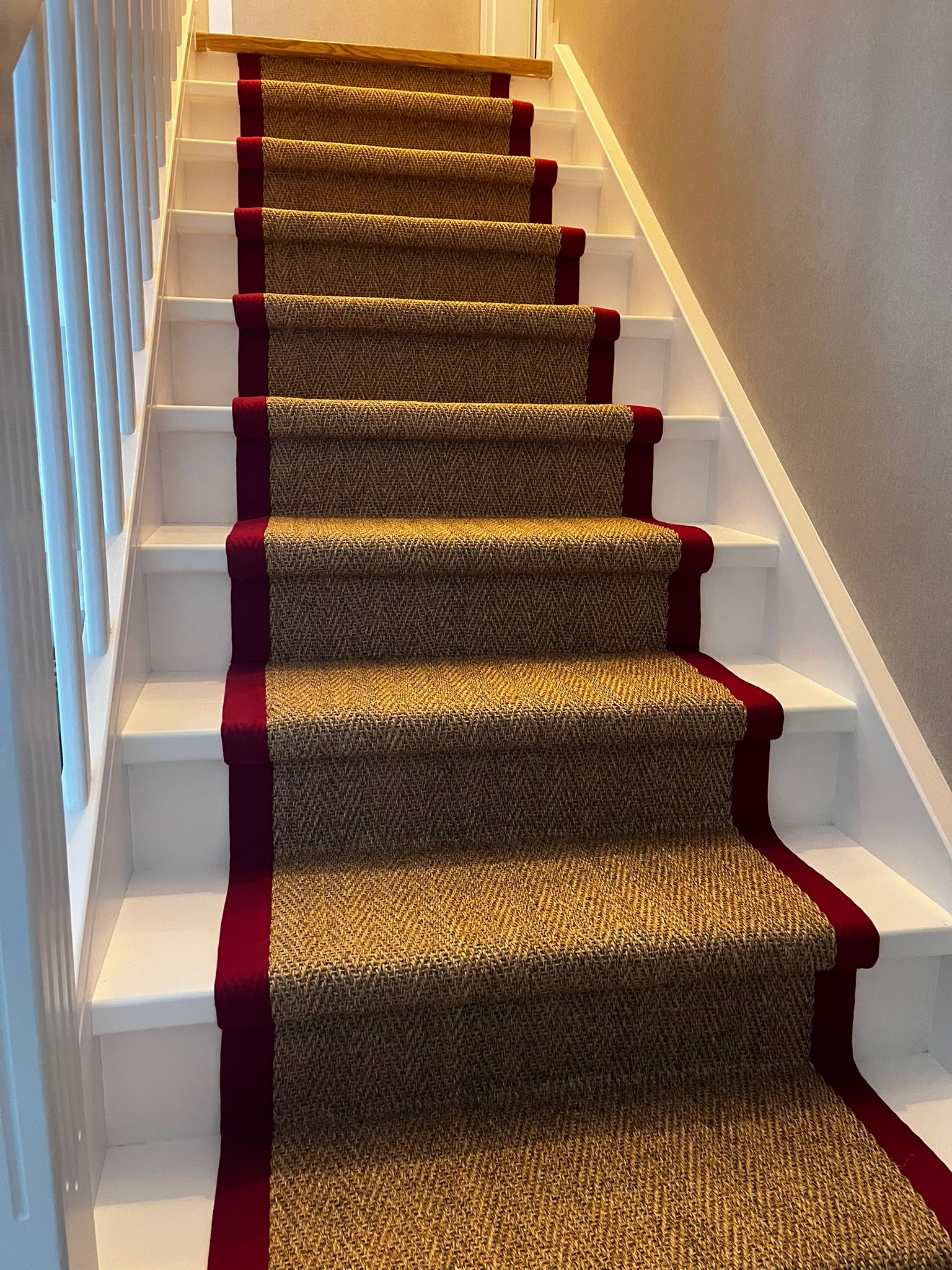 Alternative flooring sisal holbury herringbone with red cotton border
