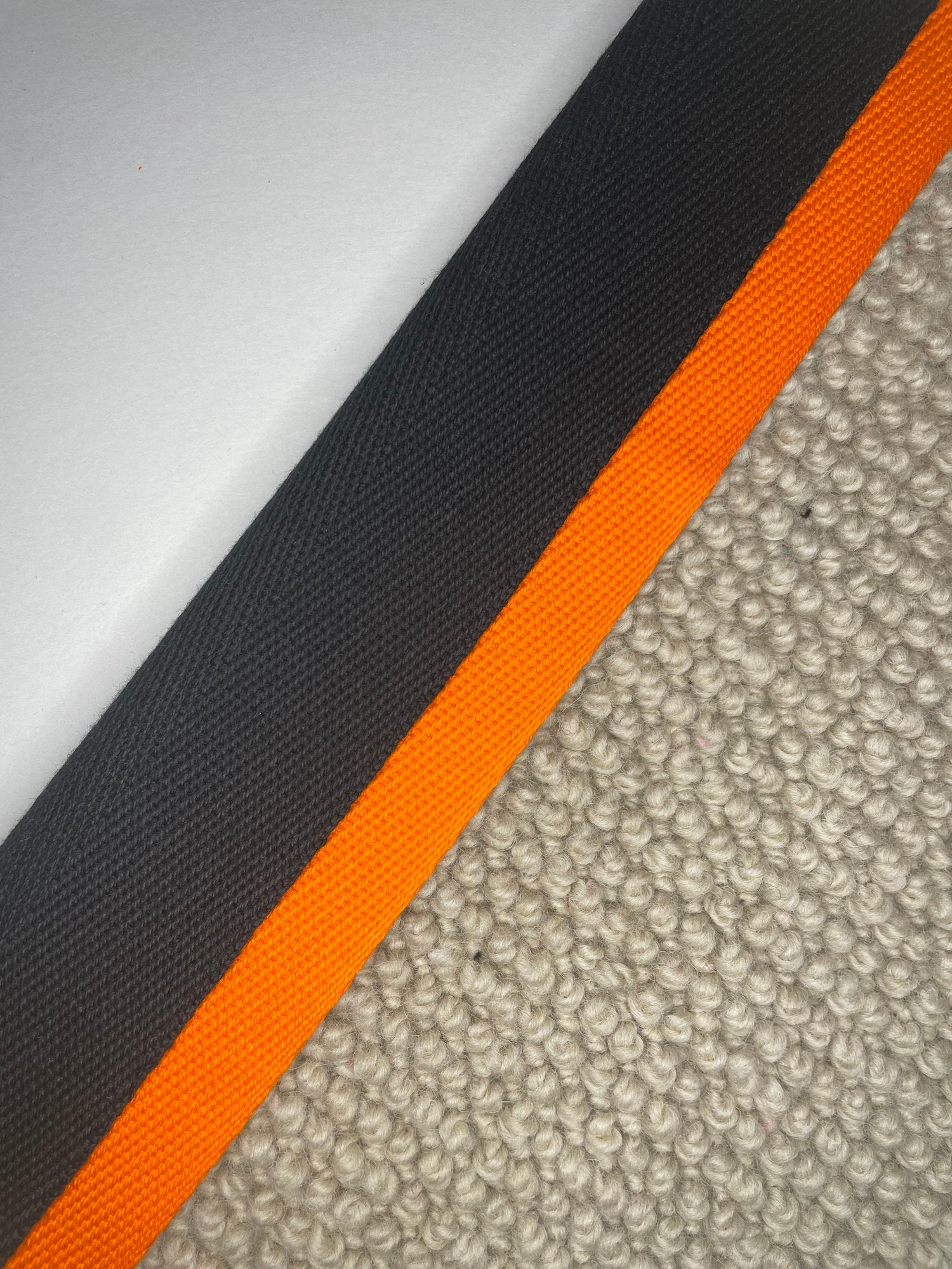 Carpet Edging Double Border Black And Vibrant Orange border tape onto carpet