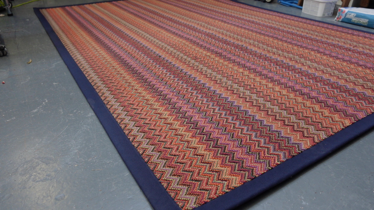 Crucial Trading fabulous ruby patterned zigzag rug with a navy blue cotton border 100% New Zealand Wool