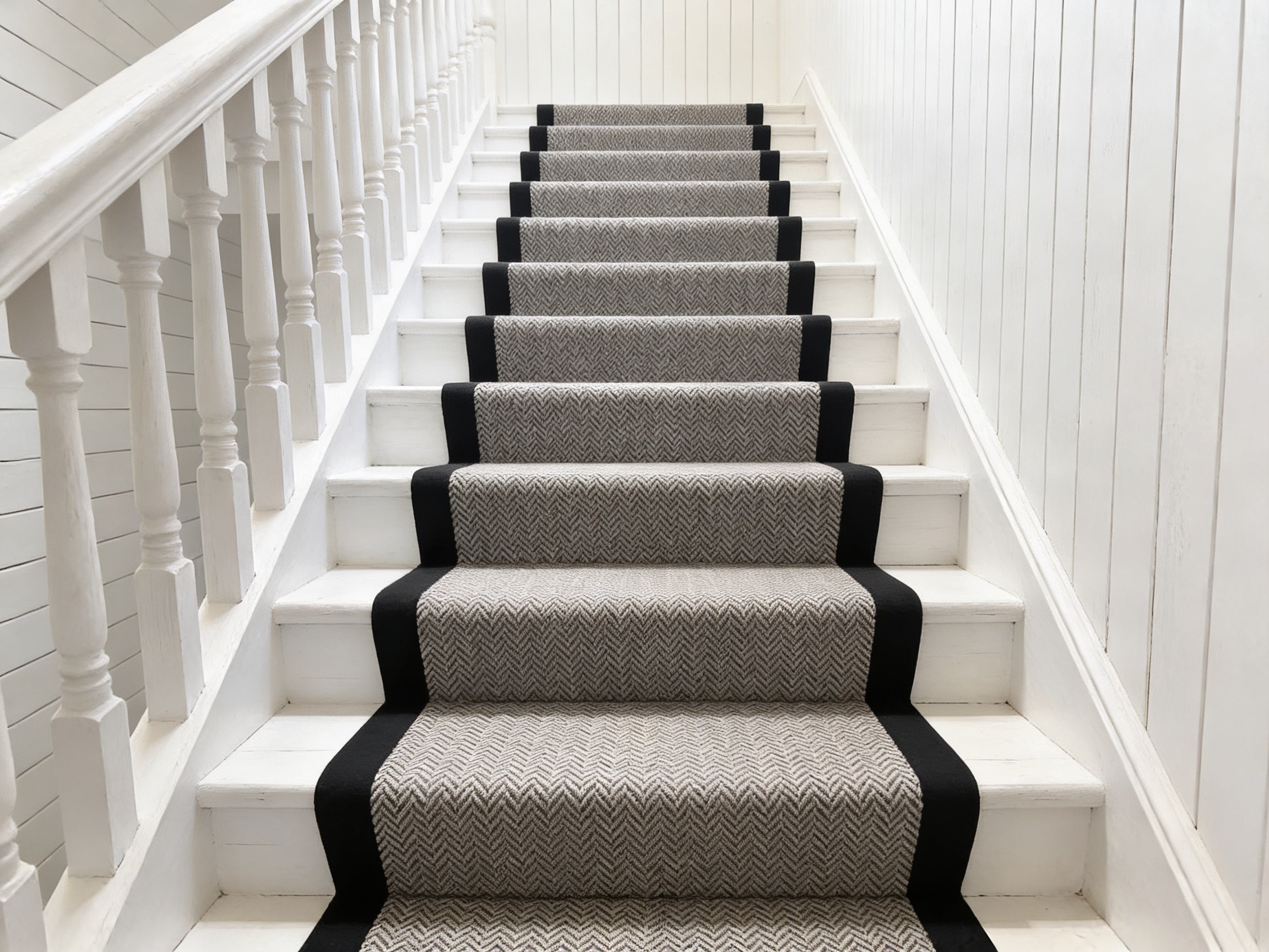 The Charleston Black — black and white herringbone faux sisal stair runner with cotton border