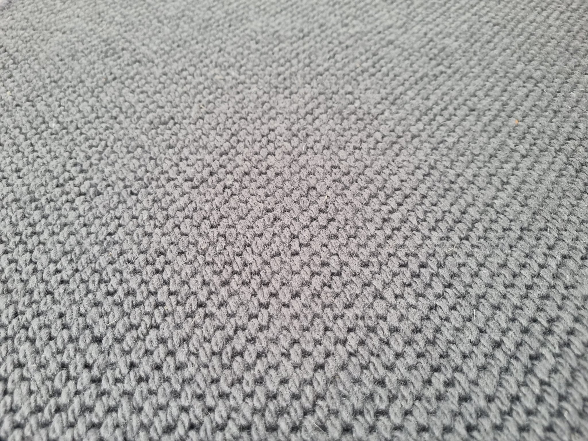 100% wool texture caste iron grey boucle loop stair runner with whipped edge